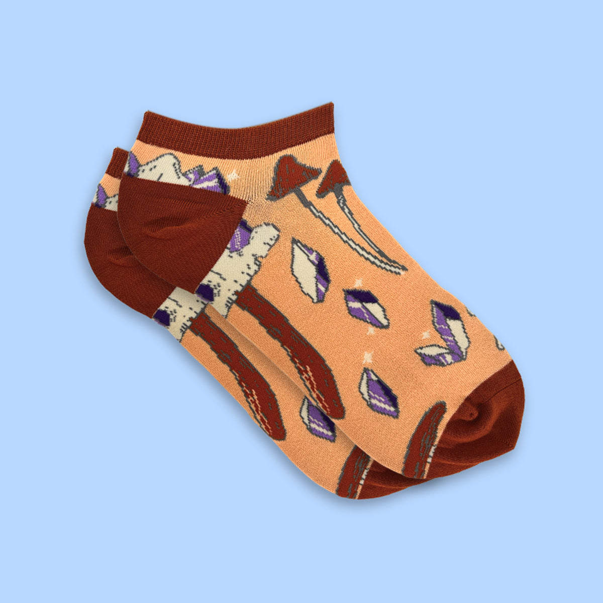 Pair of socks with a pattern on a light blue background