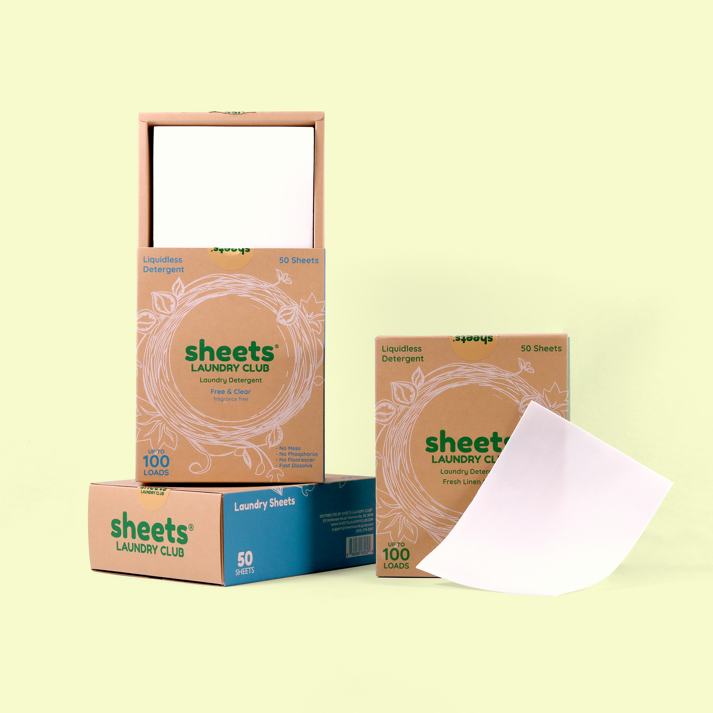 Several boxes of Sheets Laundry Club detergent displayed against a pale yellow background. The main box is open showing white sheets inside, labeled "Liquidless Detergent" with "Free & Clear" fragrance and "Up to 100 LOADS." A smaller box with blue accents indicates "50 SHEETS," and another box shows a white detergent sheet partially pulled out. Laundry detergent sheets from EcoGeek a Good Store product.