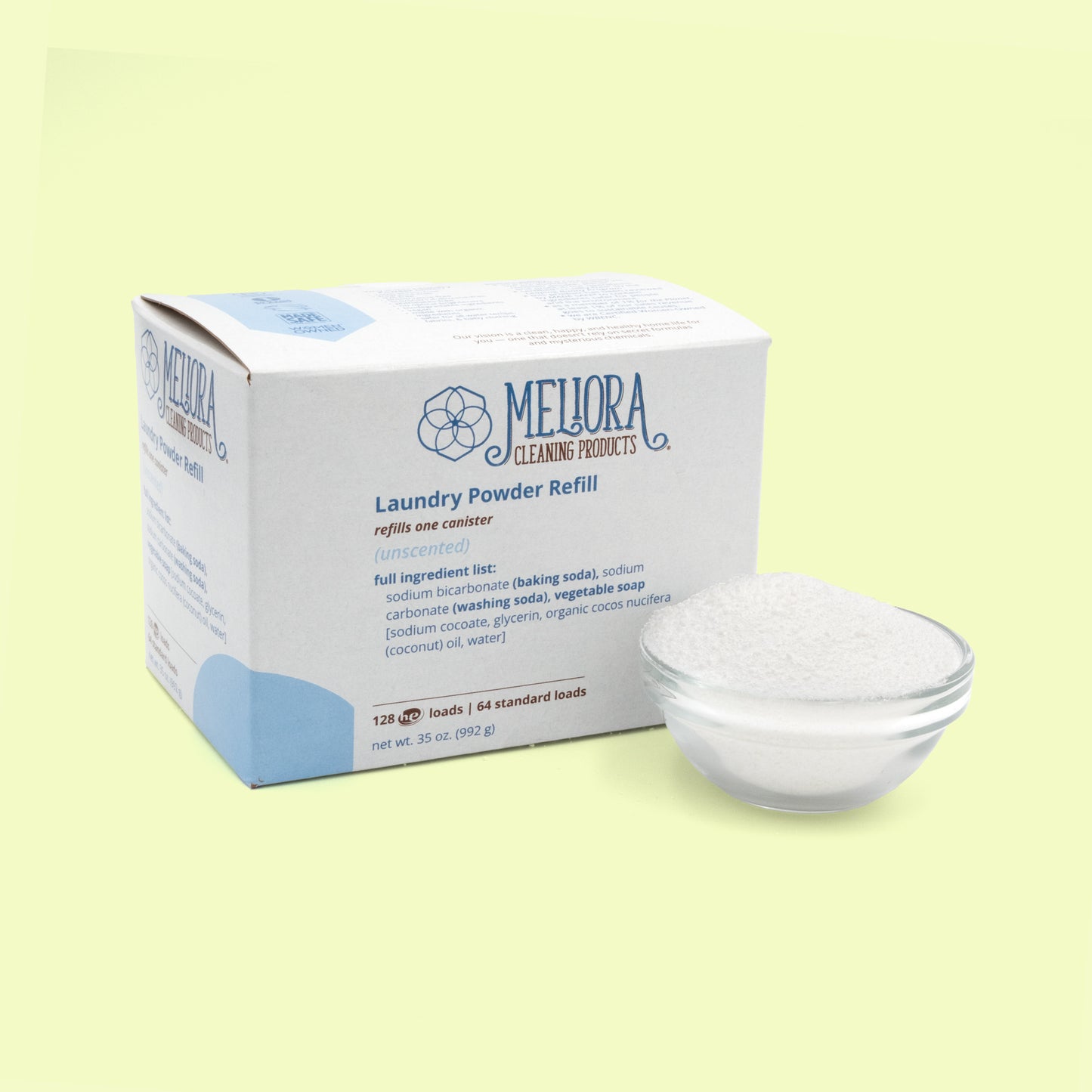 A white cardboard box of Meliora Cleaning Products Laundry Powder Refill in unscented formula, with light blue accent coloring. The box displays the geometric flower logo and ingredient list, accompanied by a clear glass bowl containing white powdered detergent. The box shows ingredient information and indicates it refills one canister with 128 HE loads or 64 standard loads, net weight 35 oz.