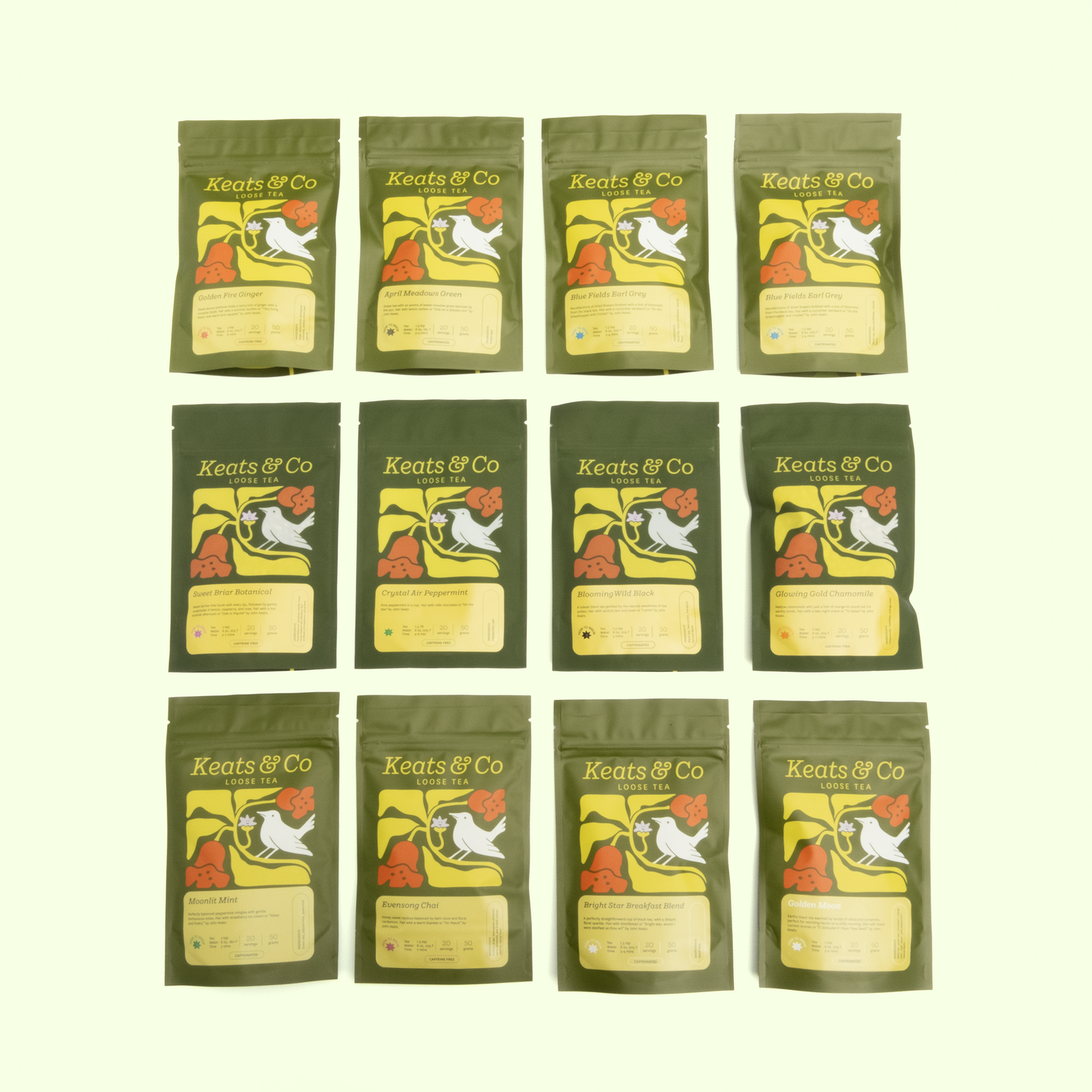 A grid arrangement of twelve Keats & Co loose tea packages displayed in three rows of four against a light mint green background. Each package features identical olive green pouches with the brand's distinctive logo: a white bird on a yellow background with orange flowers. The tea varieties are clearly labeled on yellow information panels. The uniform packaging showcases the complete tea collection with consistent branding elements.