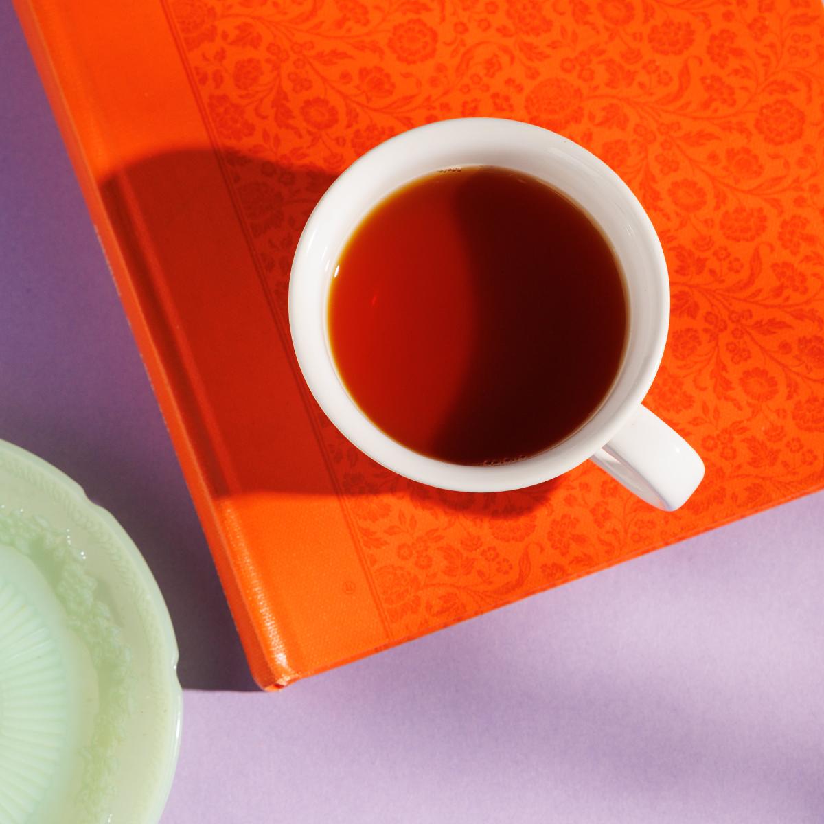 Overhead shot of mug of red-ish tea.