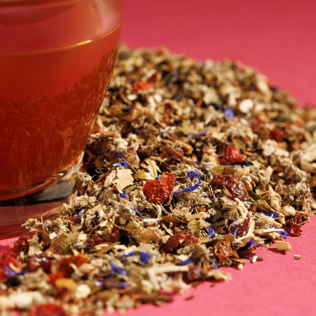 Close up Sweet Briar Botanical loose herbals with flakes or purple and pink.