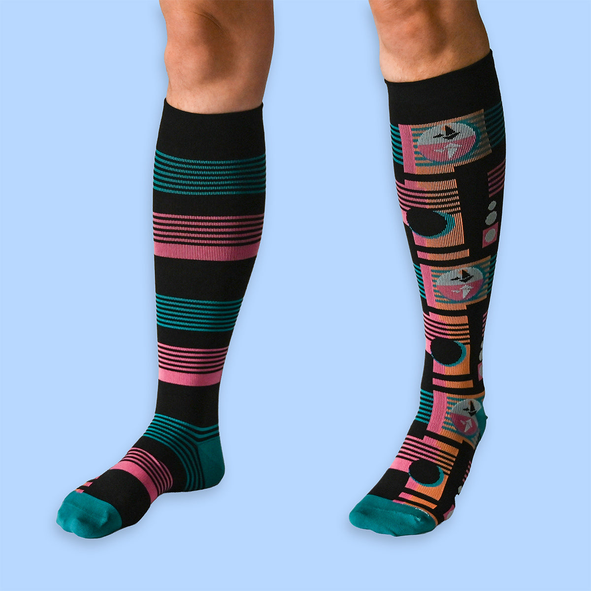 Colorful knee-high socks with geometric patterns on a light blue background