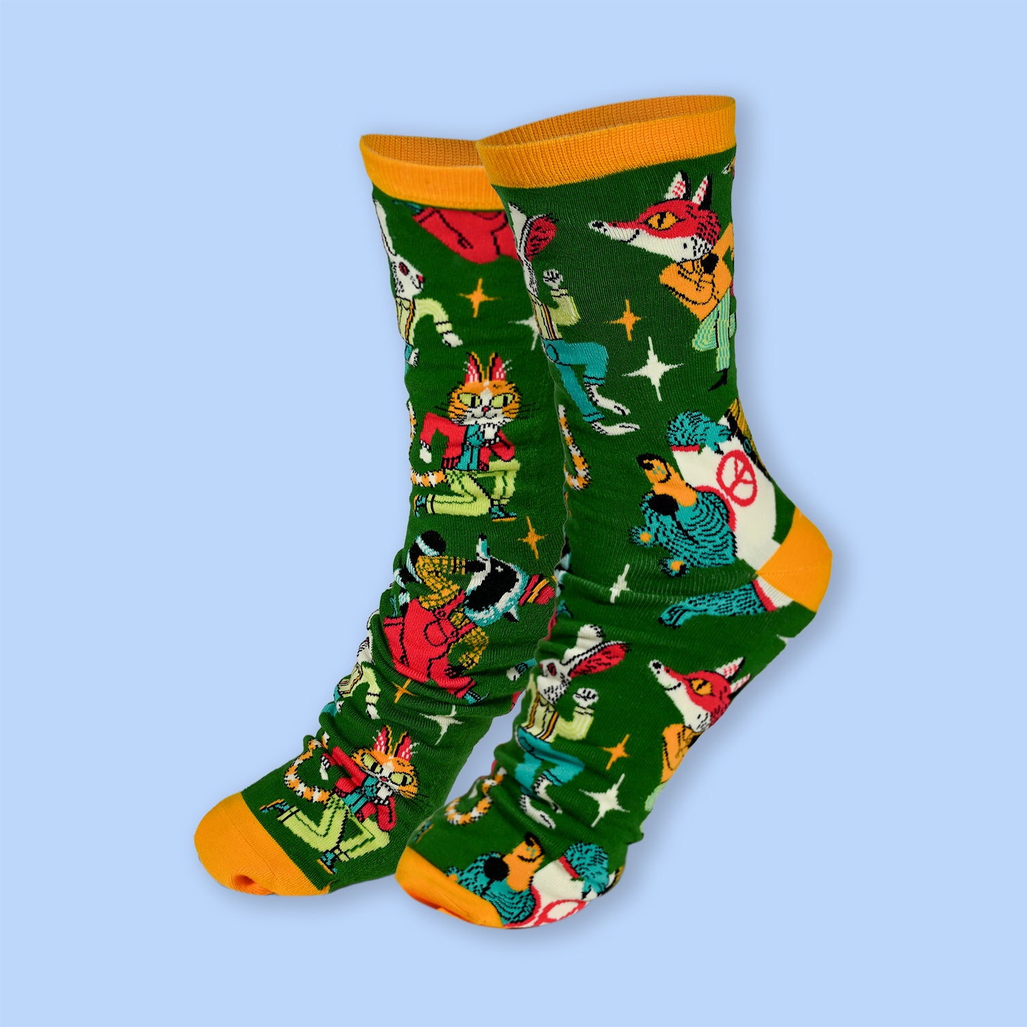 Colorful socks with animal patterns on a light blue background