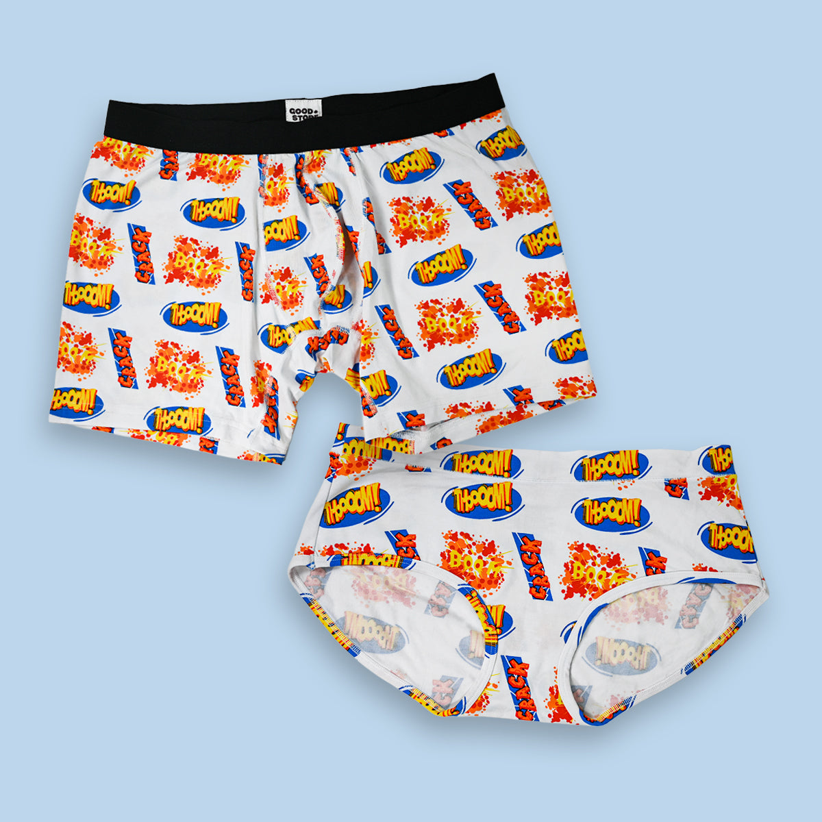Pair of boxer briefs with colorful graphic design on a light blue background