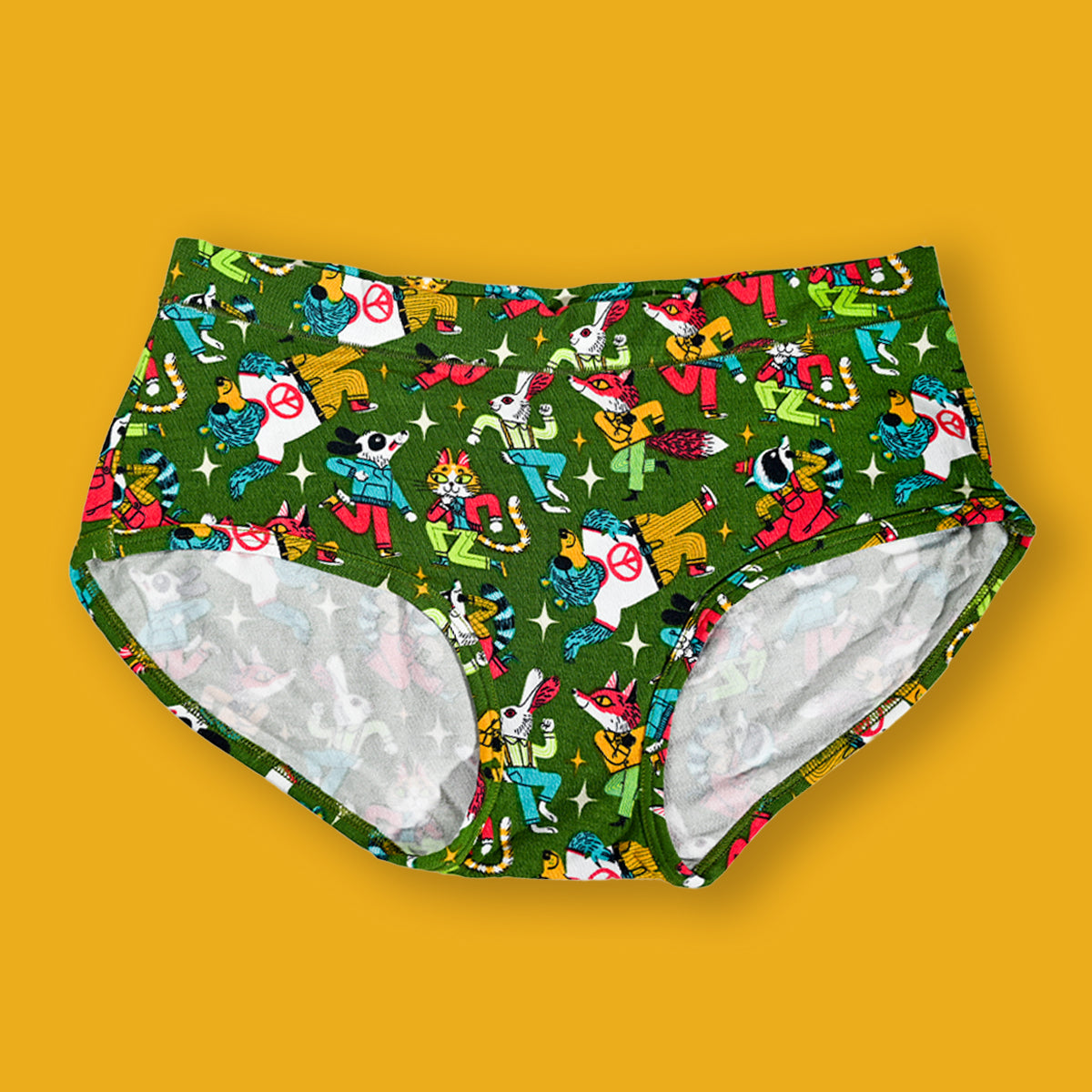 Colorful patterned underwear on a yellow background