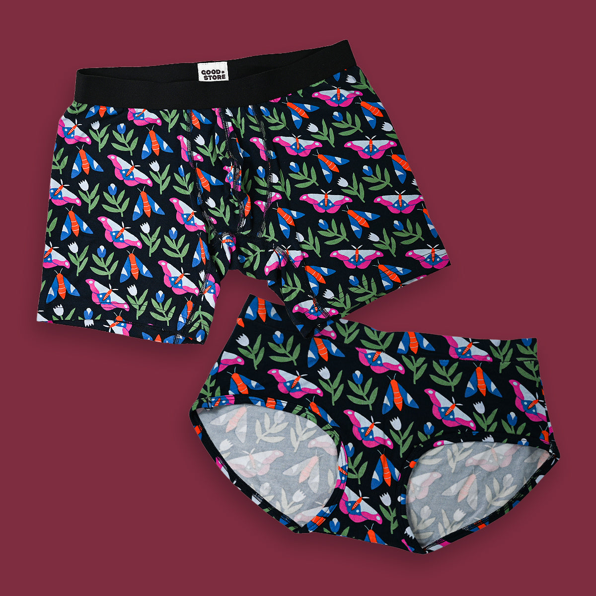 Colorful butterfly-patterned underwear on a dark background