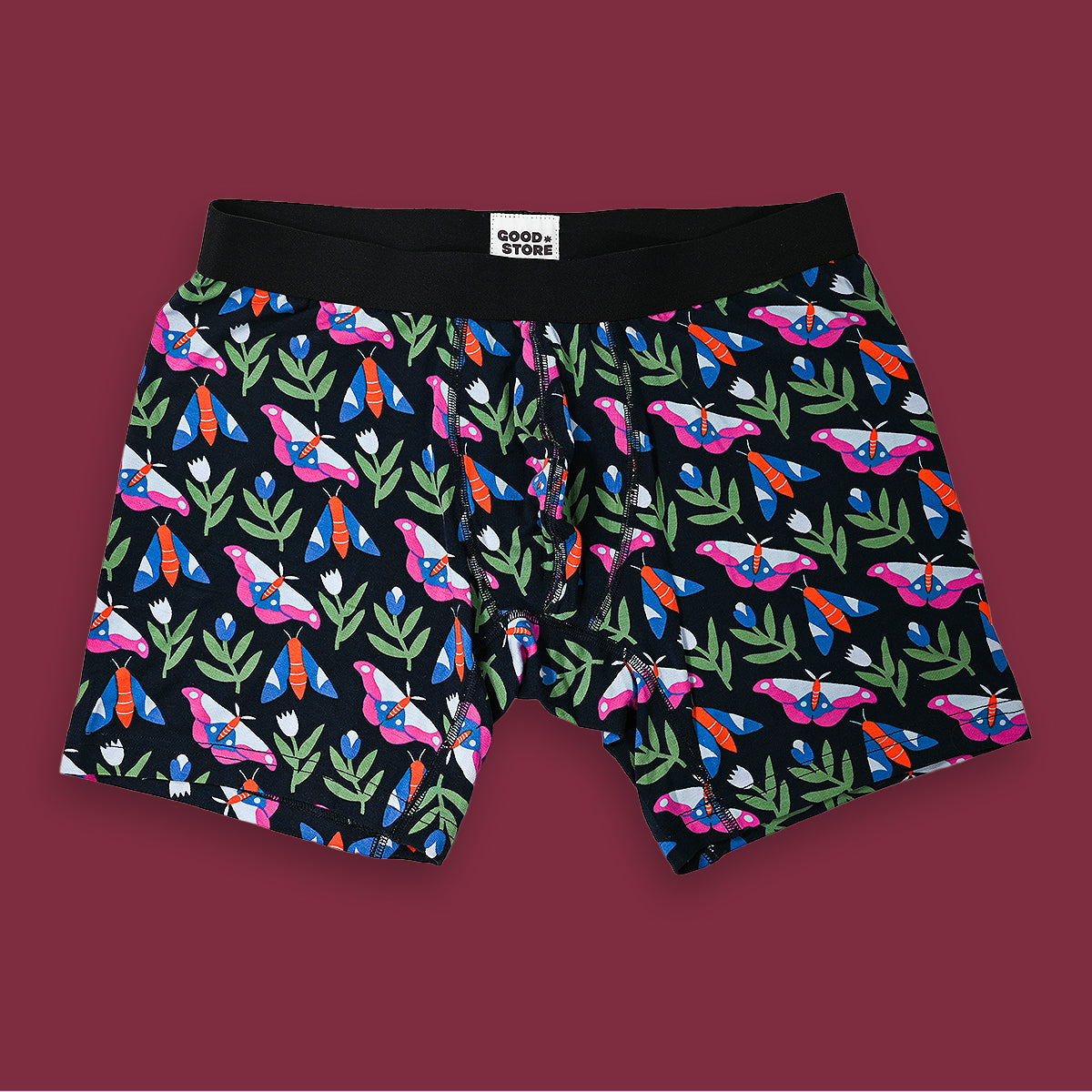 Boxer briefs with butterfly pattern on a dark background