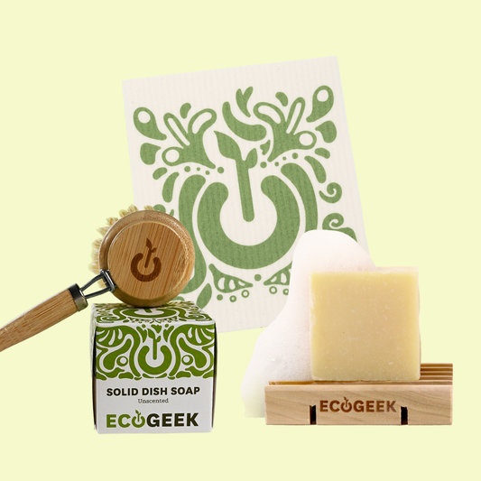 Solid dish soap, bamboo scrubber, and soap on a yellow background with 'ECOGEEK' branding.