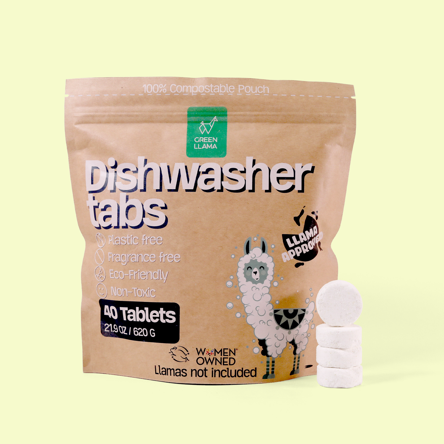 A brown compostable pouch of Green Llama dishwasher tabs against a pale yellow background. The packaging features "Dishwasher tabs" in large text, the Green Llama logo, and a cartoon llama illustration. It's labeled as plastic-free, fragrance-free, eco-friendly, and non-toxic. The package contains 40 tablets and notes it's women-owned with the humorous text "Llamas not included." Four white dishwasher tablets are stacked beside the package. Dishwasher tablets from EcoGeek a Good Store product.