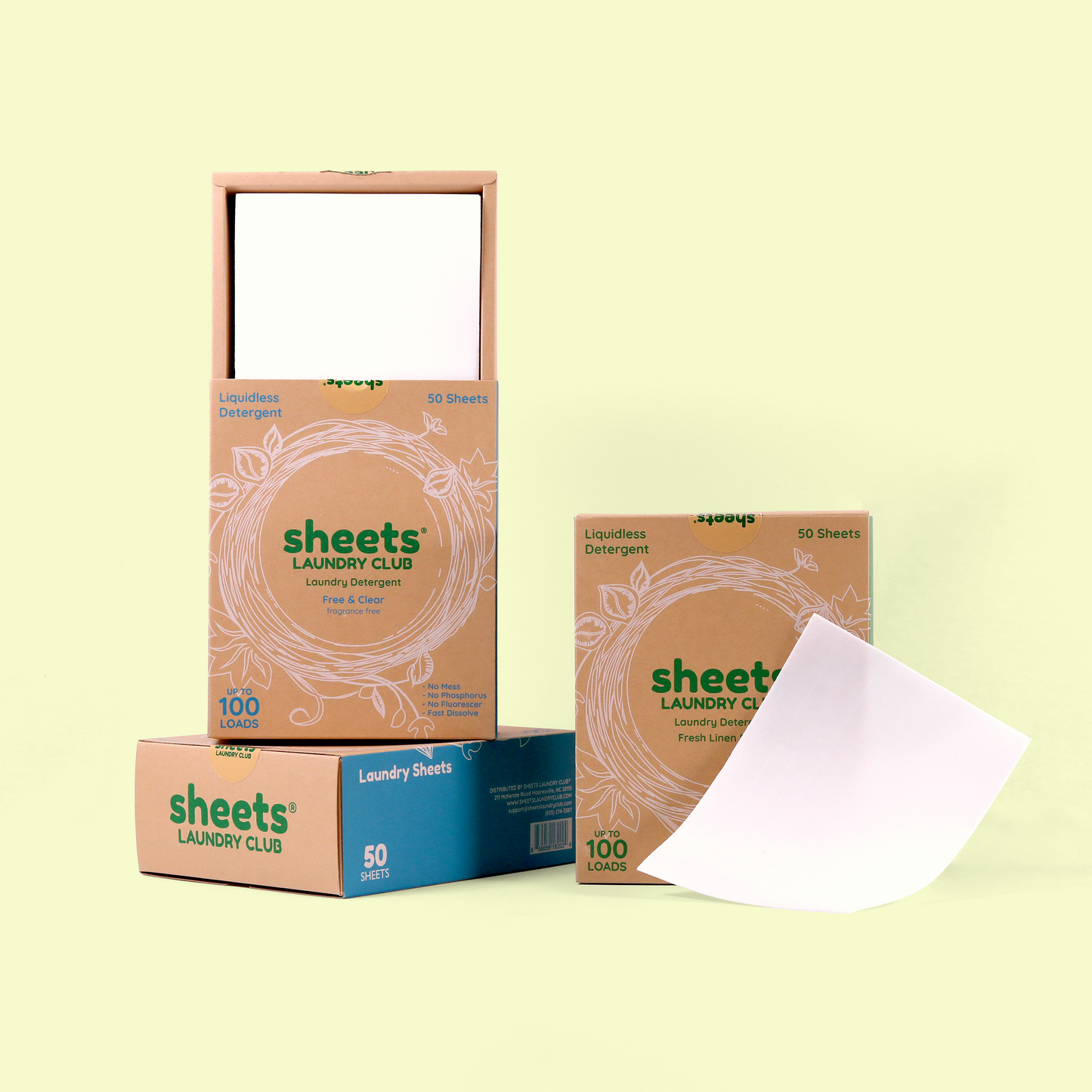  Several boxes of Sheets Laundry Club detergent displayed against a pale yellow background. The main box is open showing white sheets inside, labeled "Liquidless Detergent" with "Free & Clear" fragrance and "Up to 100 LOADS." A smaller box with blue accents indicates "50 SHEETS," and another box shows a white detergent sheet partially pulled out. Laundry detergent sheets from EcoGeek a Good Store product.