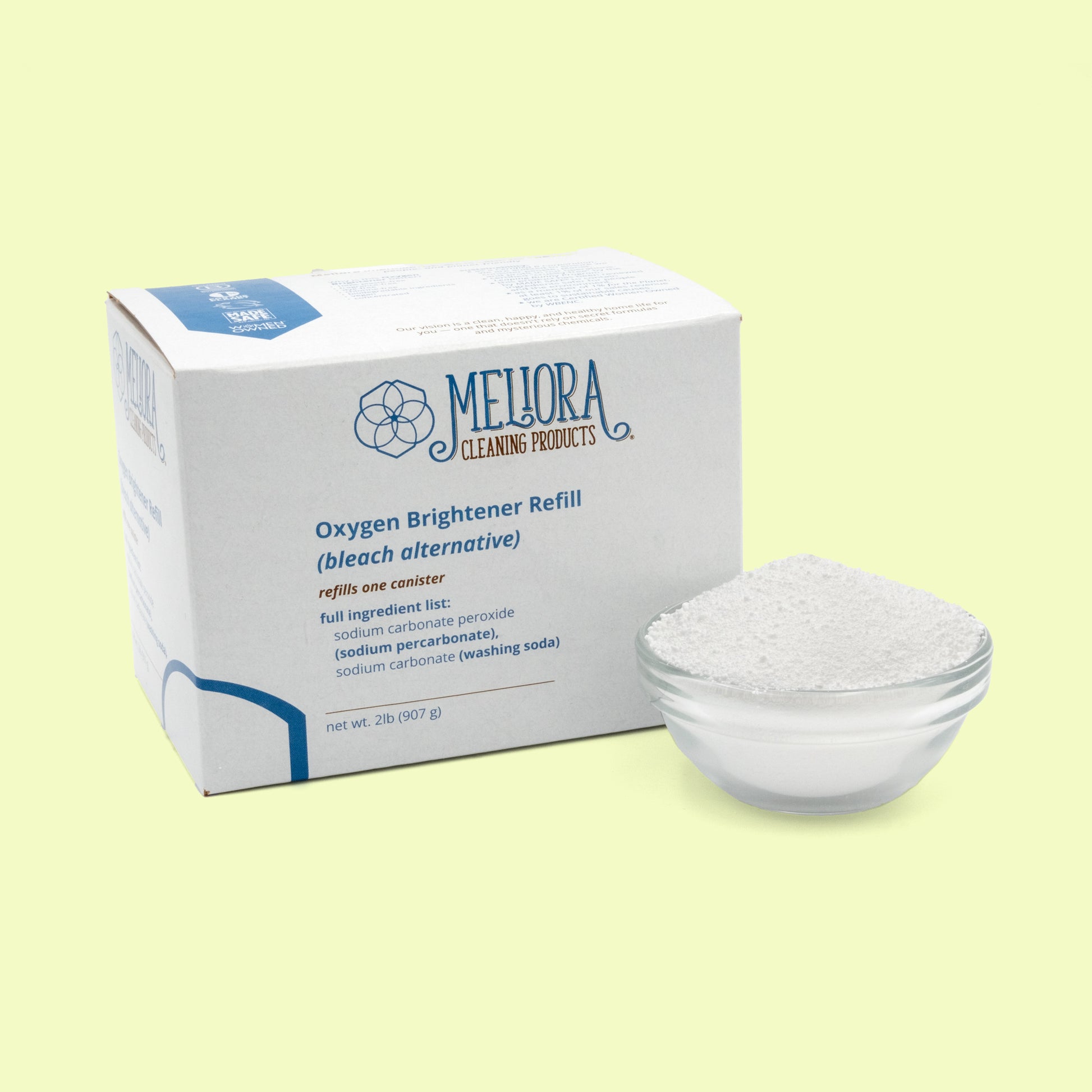 Meliora Cleaning Products Oxygen Brightener displayed against a pale yellow background. The cardboard box container shows the label "Oxygen Brightener (bleach alternative)" and lists ingredients including sodium carbonate peroxide and washing soda. The product is advertised as plastic-free, dye-free, and fragrance-free. Next to it is a small bowl filled with white powder. Oxygen brightener bleach alternative from EcoGeek a Good Store product.