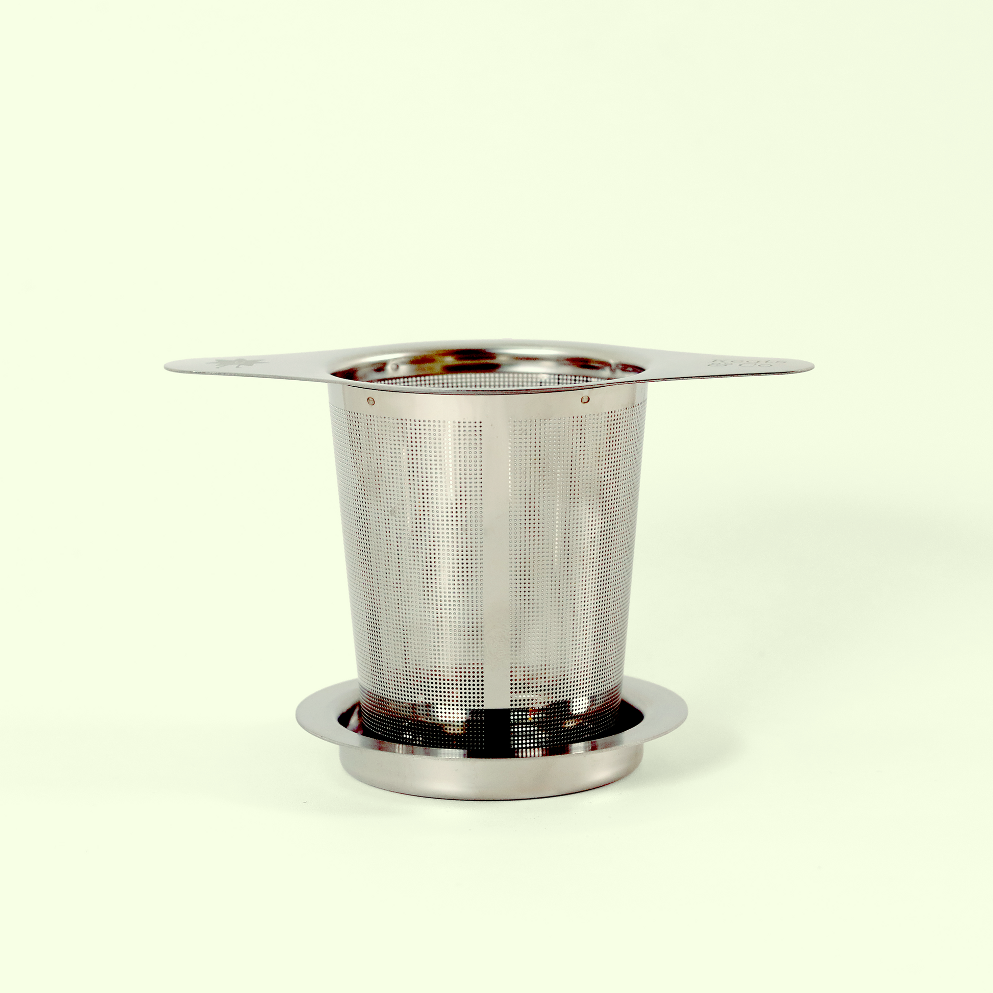 image of tea infuser, showing its mesh basket sitting on the lid. Keats & Co - Good Store. 